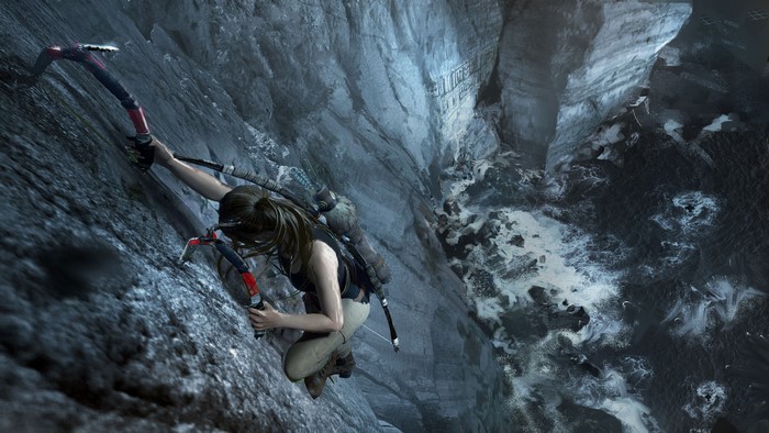 Lara Croft from Tomb Raider climbing a cliff