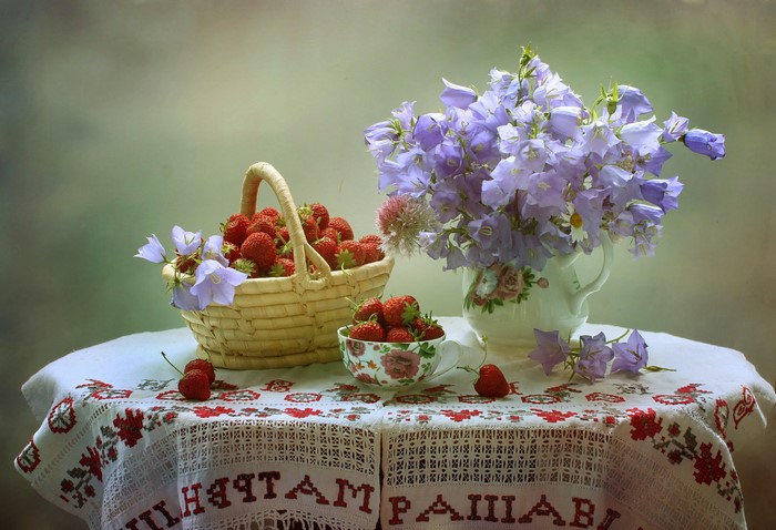 Still life with strawberries and campanula flowers