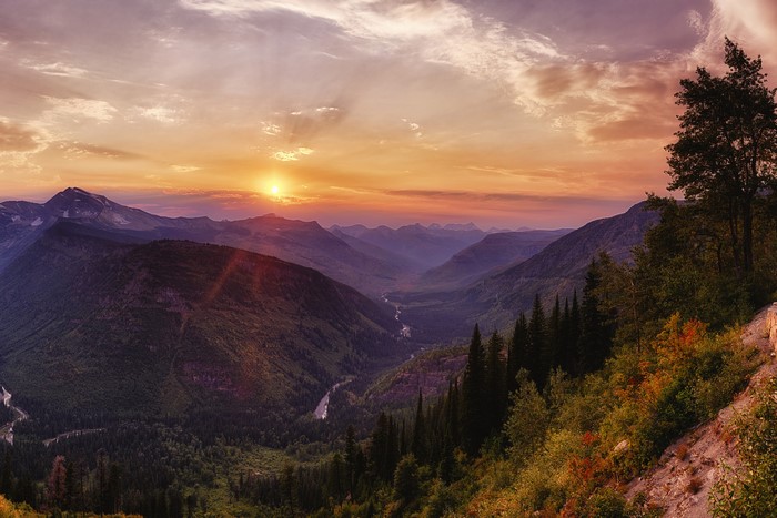 Sunset over Glacier National Park Mountains