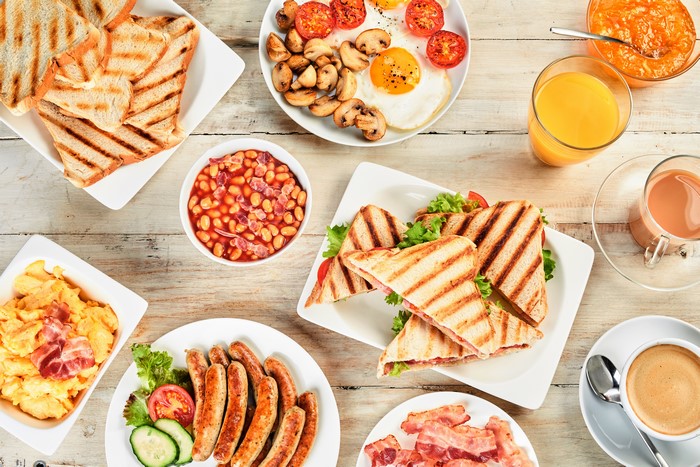Full English Breakfast with Sandwiches and Orange Juice