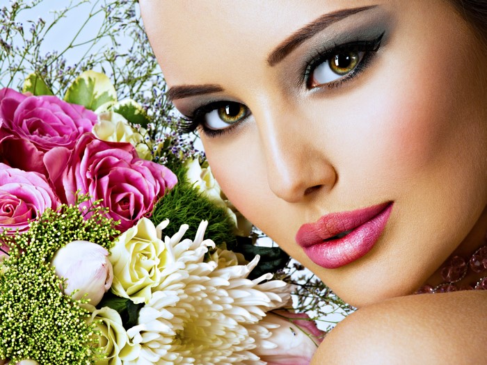 Woman with makeup and bouquet