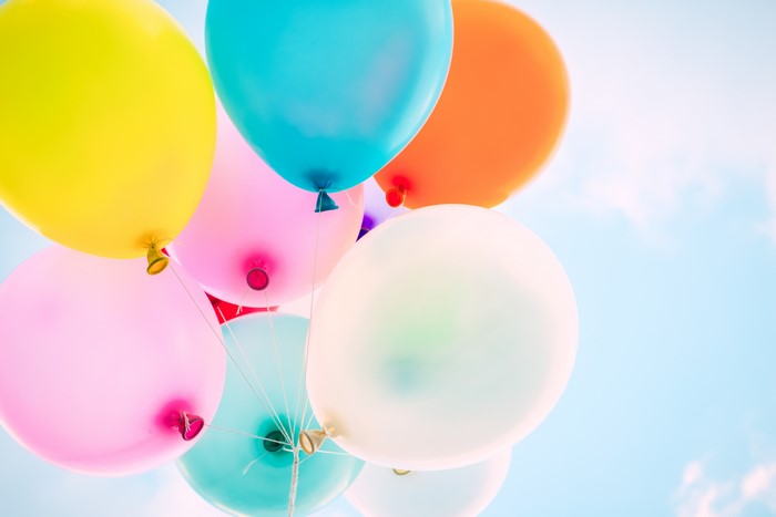 Colorful balloons floating in the sky