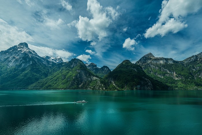 Boat on Lake Lucerne with Mountains in Switzerland