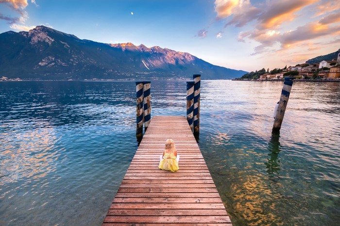 Girl on a dock at Lake Garda, Italy