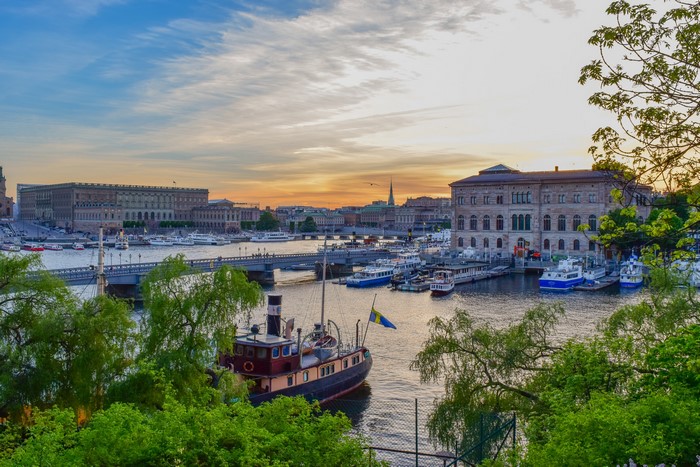 Stockholm cityscape with boats and buildings at sunset