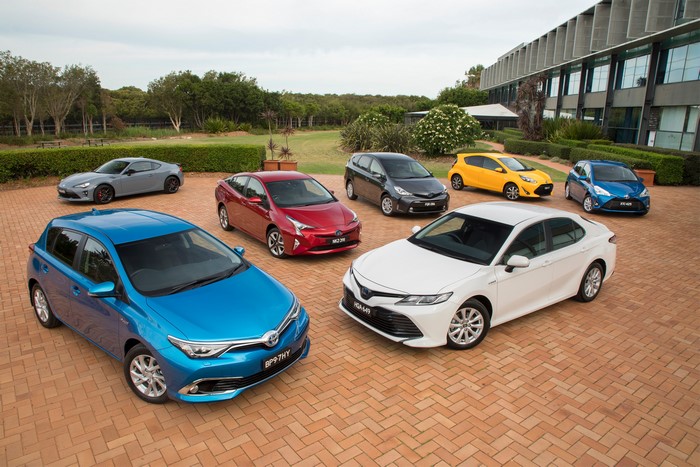 Toyota cars parked on brick patio