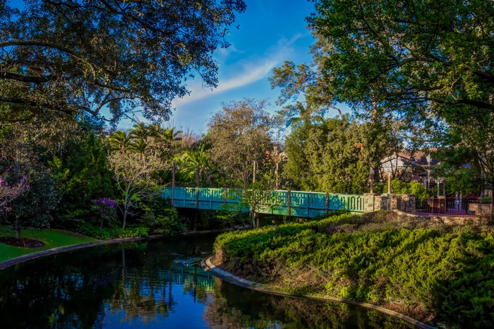 Green bridge over a pond at Disneyland, California