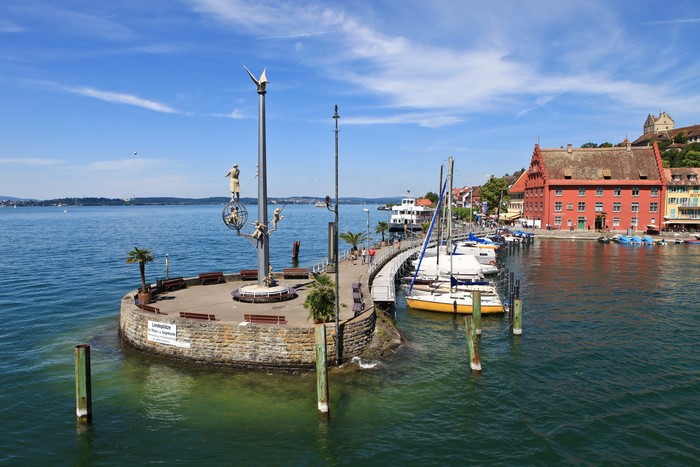 Sculpture and boats in Meersburg, Germany harbor