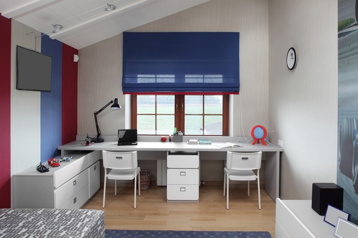 Children's room with desks and chairs