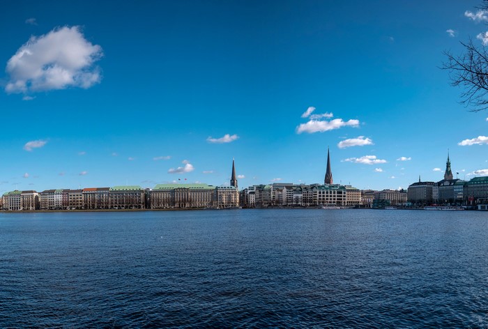 Hamburg skyline with buildings and spires over water