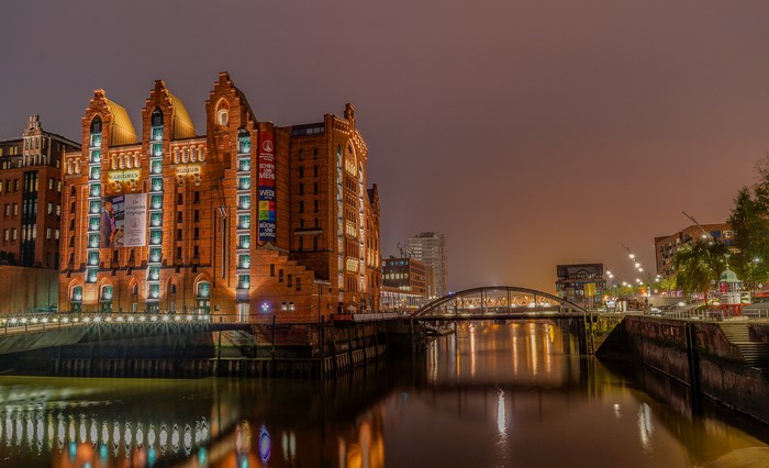 Speicherstadt Hamburg at night with river and bridge