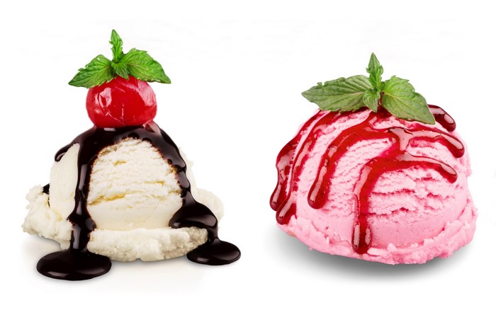 Two scoops of ice cream with toppings