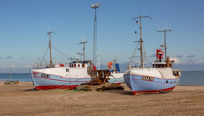 Fishing boats on a sandy beach