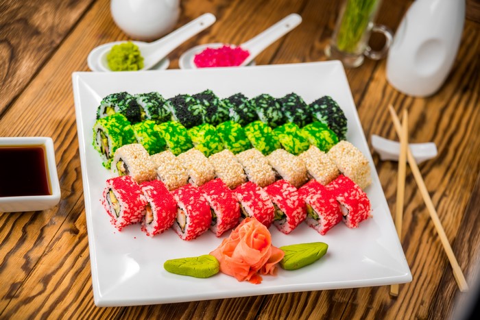 Sushi platter with soy sauce and chopsticks