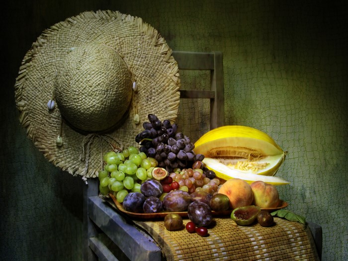Still-life with fruit, hat, and chair