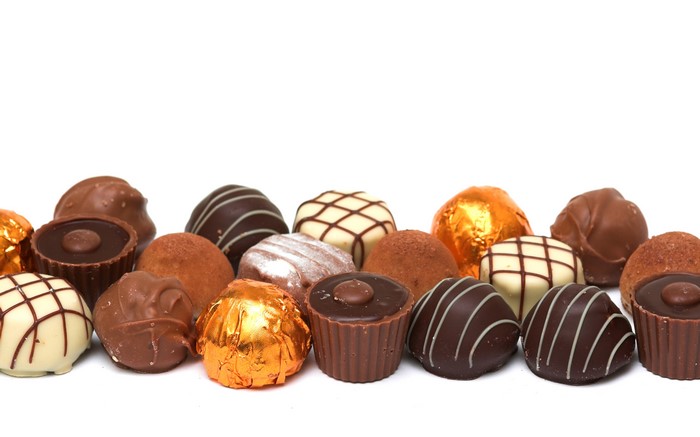 Assortment of chocolates on a white background