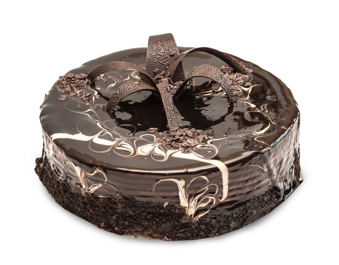 Chocolate cake with chocolate shavings and swirls