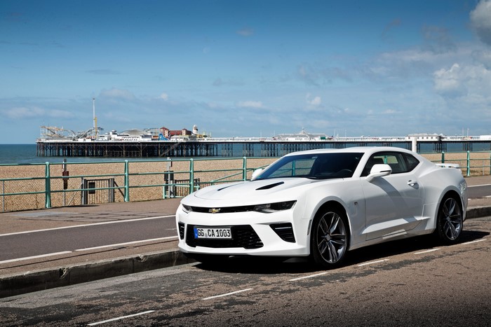 White Chevrolet Camaro by the Pier