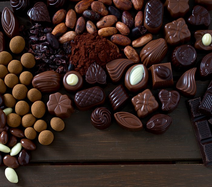 Assortment of chocolates and cocoa beans