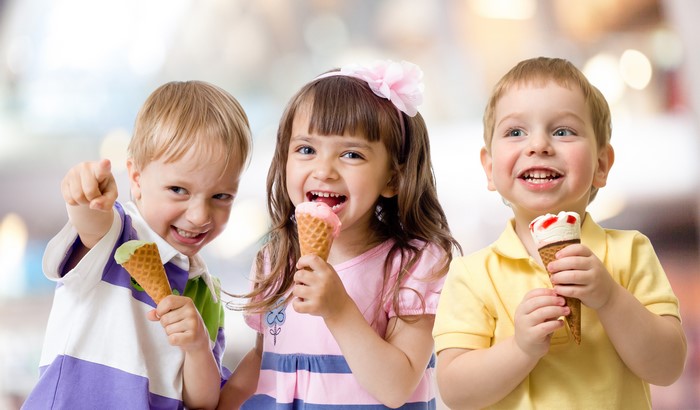 Three Children Eating Ice Cream Cones