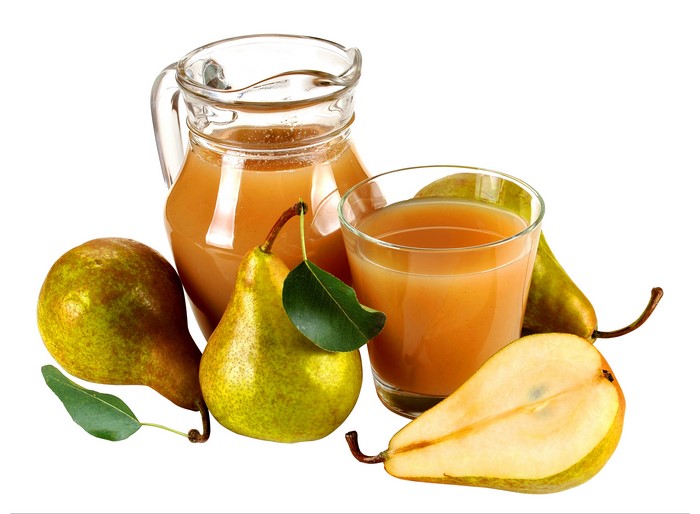 Pear juice in a jug and glass with pears