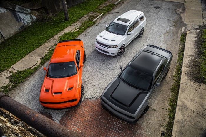 Three Dodge cars from above