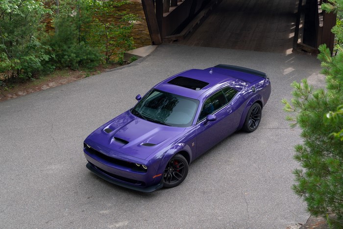 Purple Dodge Challenger R-T Scat Pack Widebody parked on road