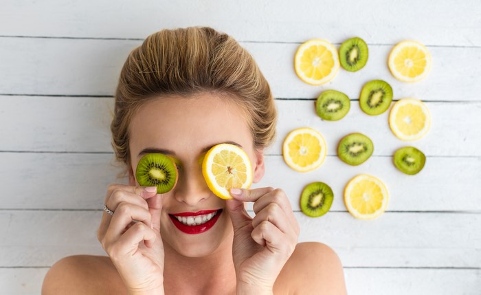 Woman with Kiwi and Lemon Slices