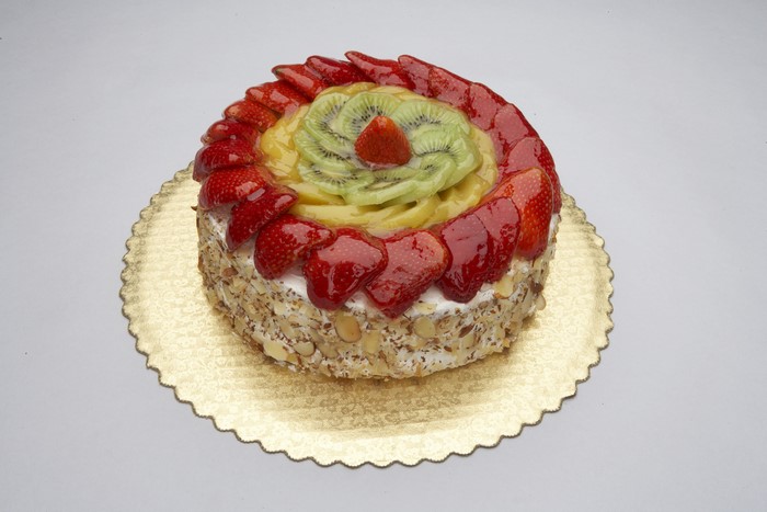 Fruit cake with strawberries and kiwi