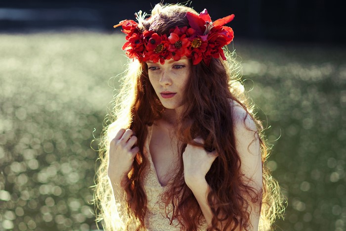 Redhead girl with flower wreath