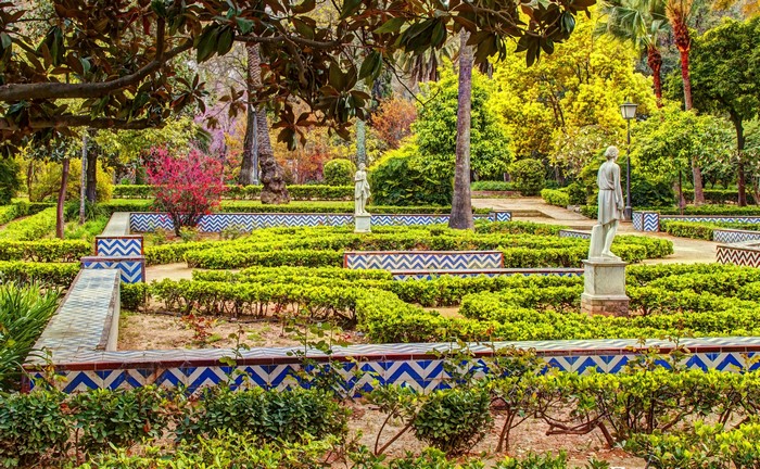 Maria Luisa Park in Seville, Spain with sculptures and gardens