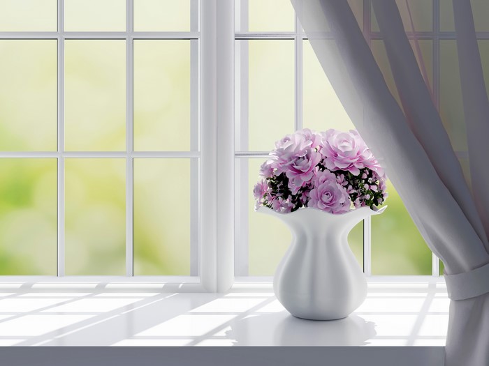 Bouquet of Roses in a Vase on a Windowsill