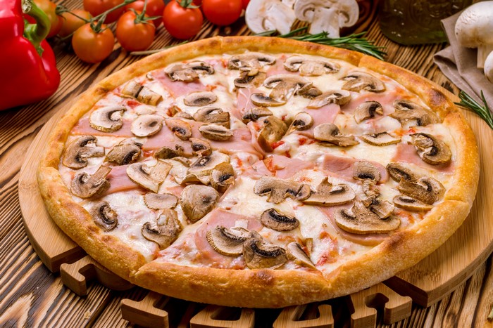 Pizza with mushrooms and ham