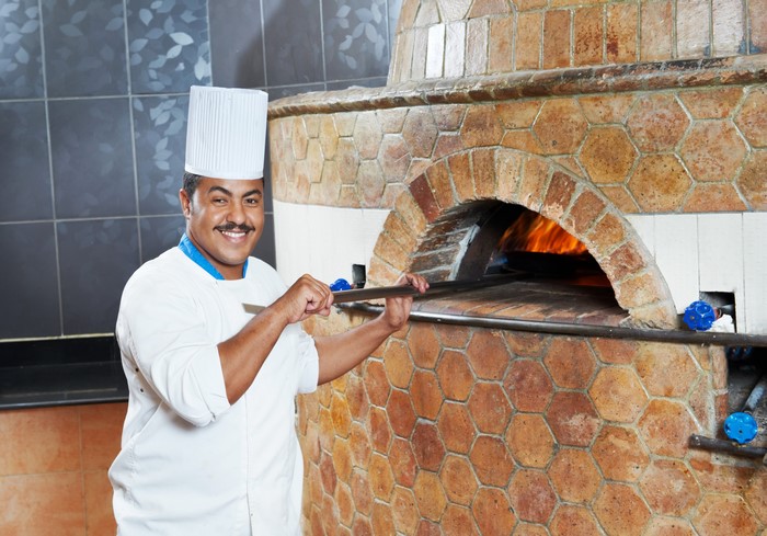 Chef with Pizza Oven