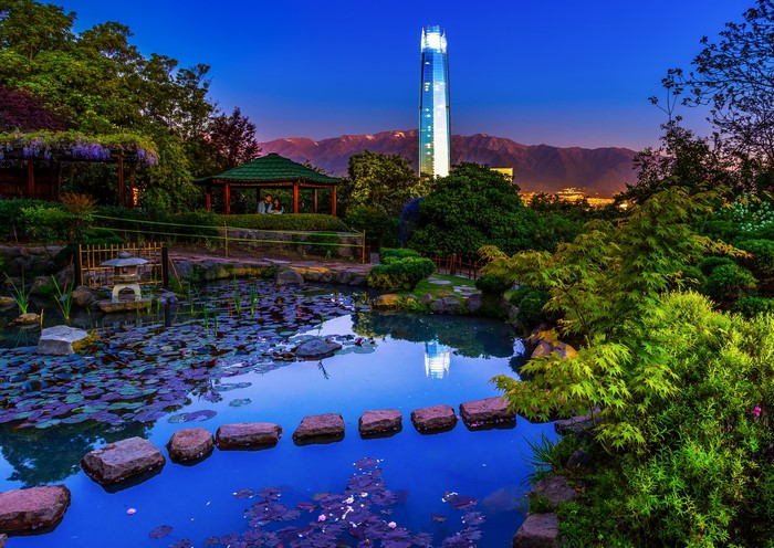 Santiago Japanese Garden at dusk with skyscraper