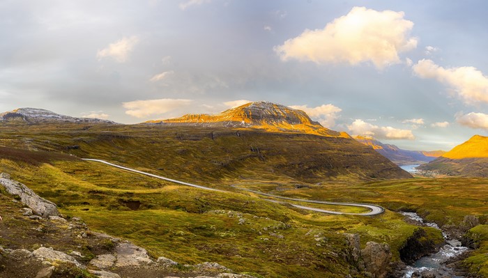 Roads winding through hills in Sudur-Mulasysla, Iceland