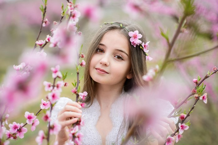 Little girl with flowers in hair