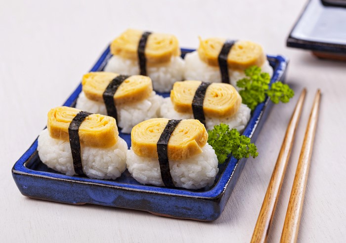 Tamagoyaki Sushi on Blue Plate