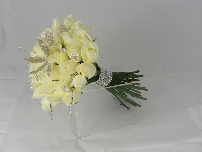 White rose bouquet with silver dragonfly embellishment