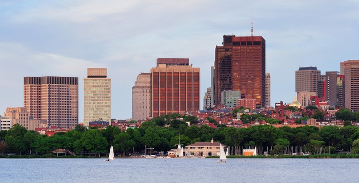 Boston skyline with sailboats on the river