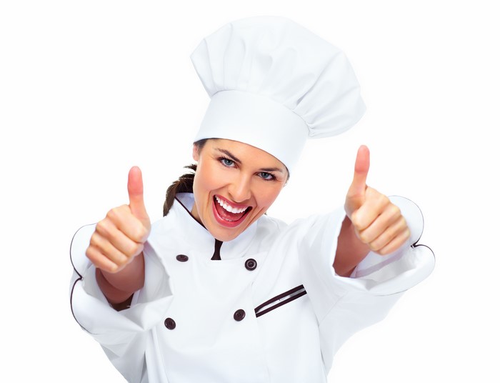 Chef giving thumbs up on white background