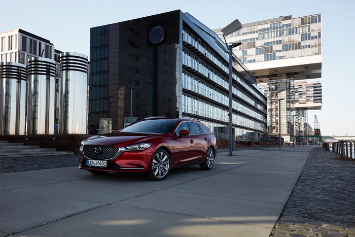Red 2018 Mazda 6 Wagon in Modern City