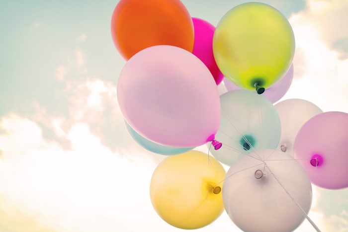 Colorful balloons floating in the sky
