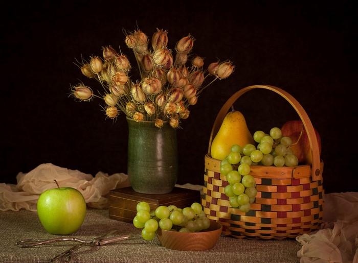 Still-life with fruits, dried flowers, and a vase