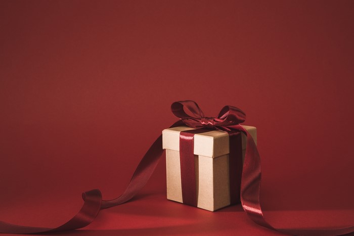 Gift box with red ribbon and bow