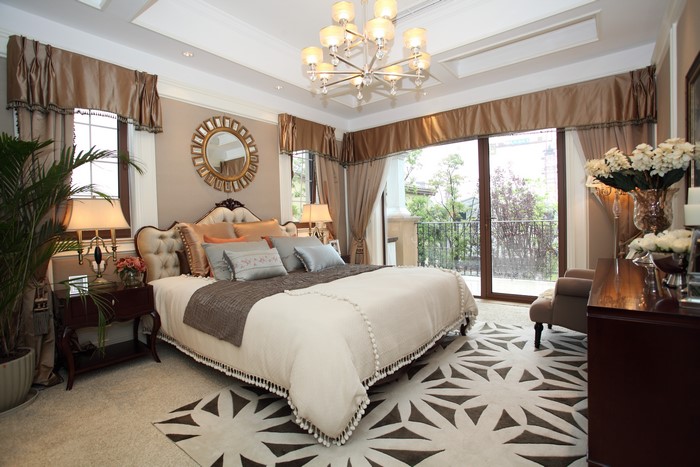 Luxurious Bedroom with Chandelier and Bed