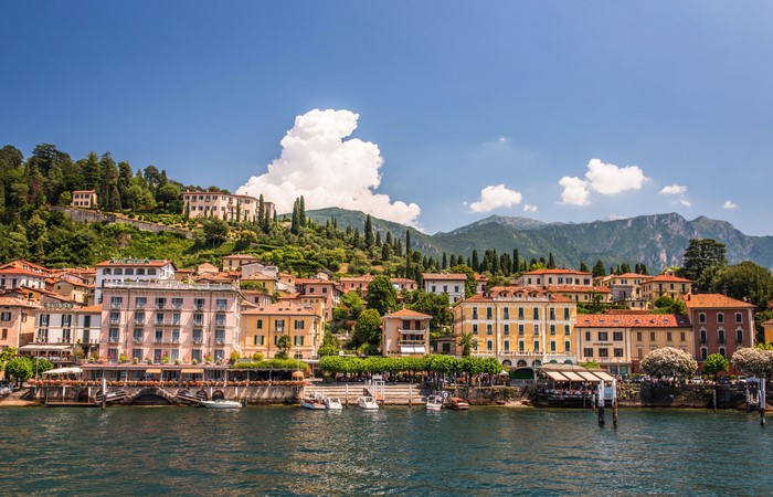 Bellagio, Italy waterfront with colorful buildings and mountains