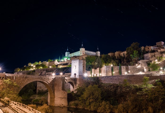 Toledo, Spain at Night with Bridge and Castle