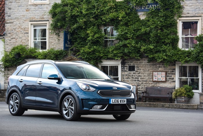 Blue 2016 Kia Niro First Edition parked outside a pub