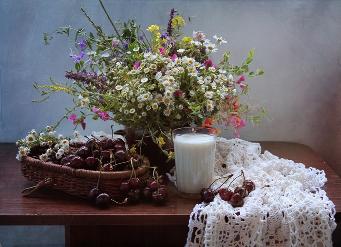 Still life with bouquet, cherries, and milk